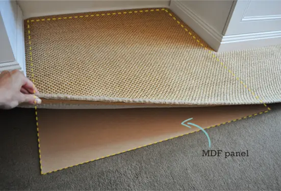 How to Keep a Rug in Place on Carpet